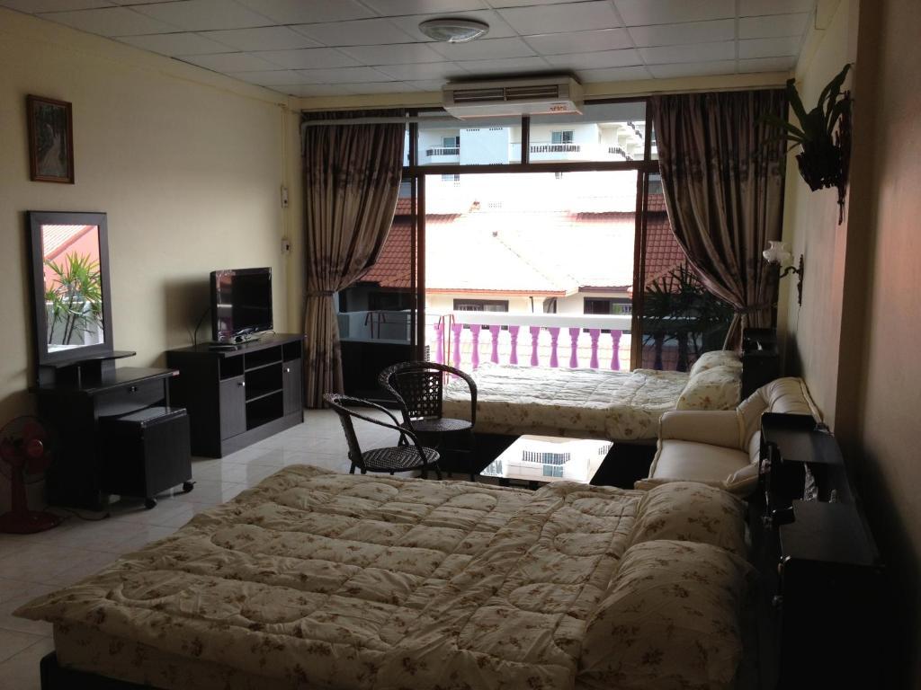 Artem's Guesthouse Jomtien Beach Extérieur photo